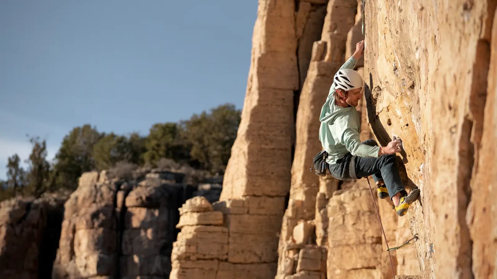 Page author rock climbing on a sunny day